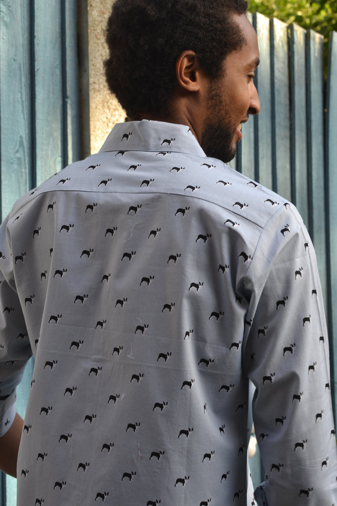 Blue canine print shirt.