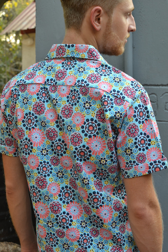 Sky blue short sleeve shirt.