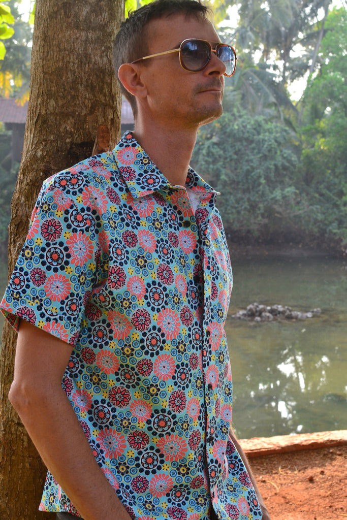Sky blue short sleeve shirt.