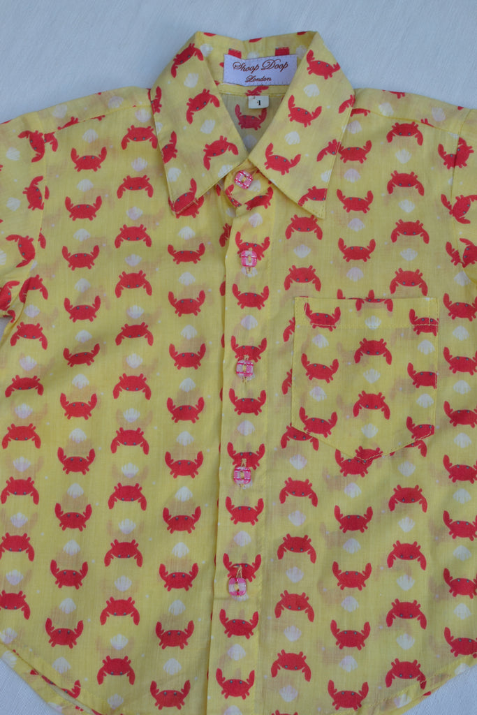 Yellow & red kids crab shirt.