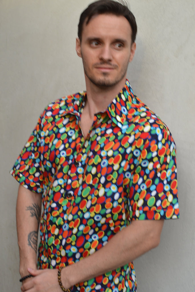 Short sleeve multi coloured shirt.