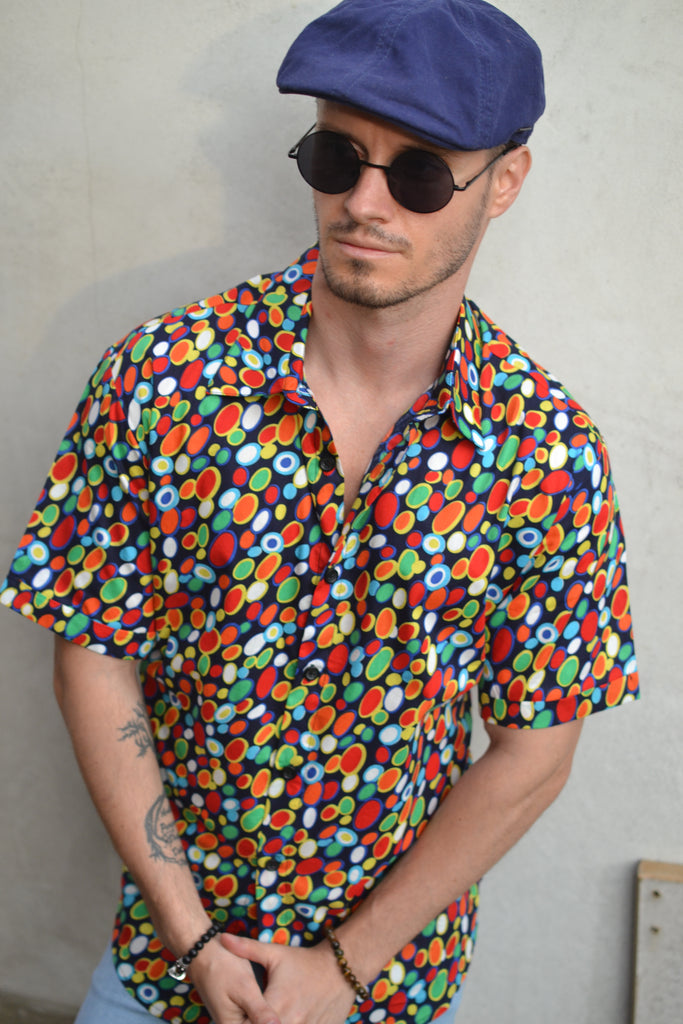 Short sleeve multi coloured shirt.